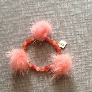 NWT Cute sunset bracelet with pink Pom poms